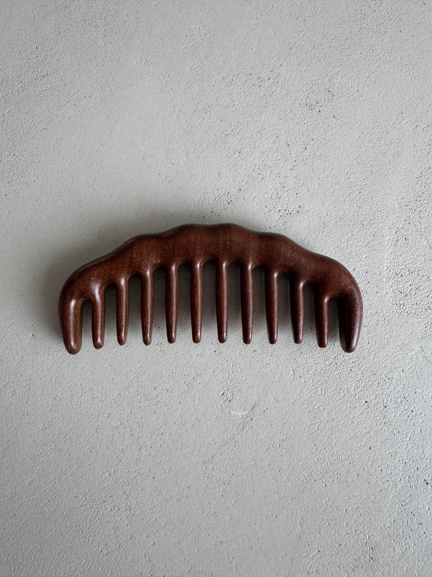 Wooden wide tooth comb
