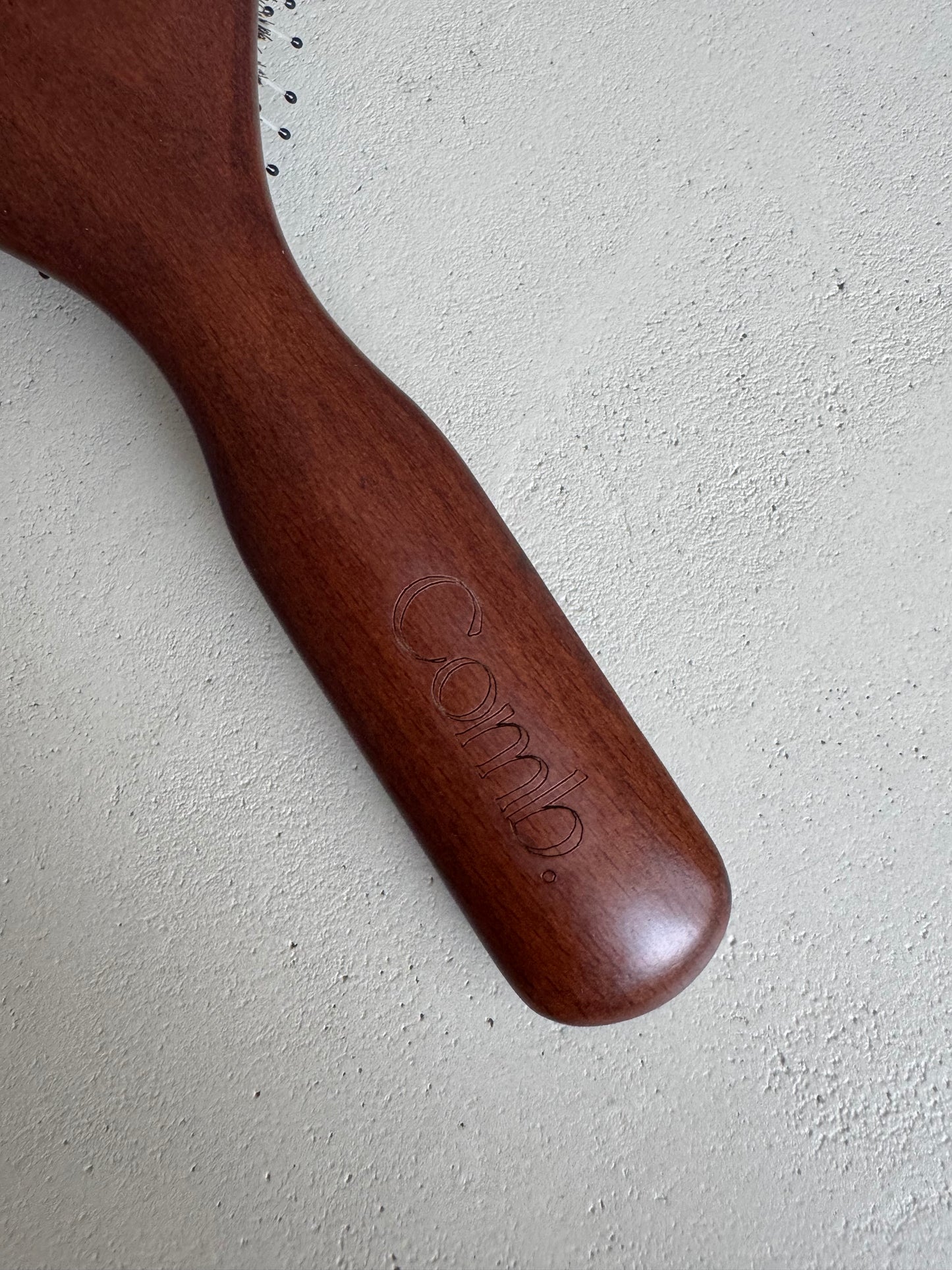 Wooden boar bristle brush